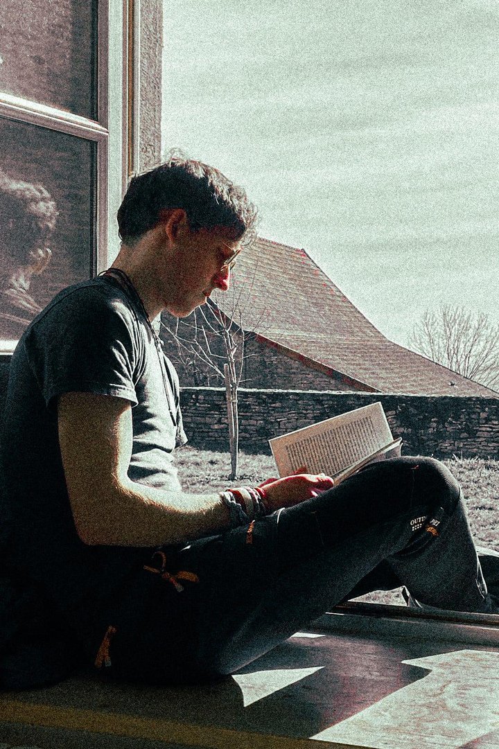 Archie reading a book